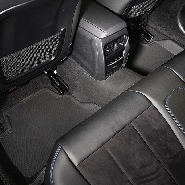 Close-up of a car's center console and seat.